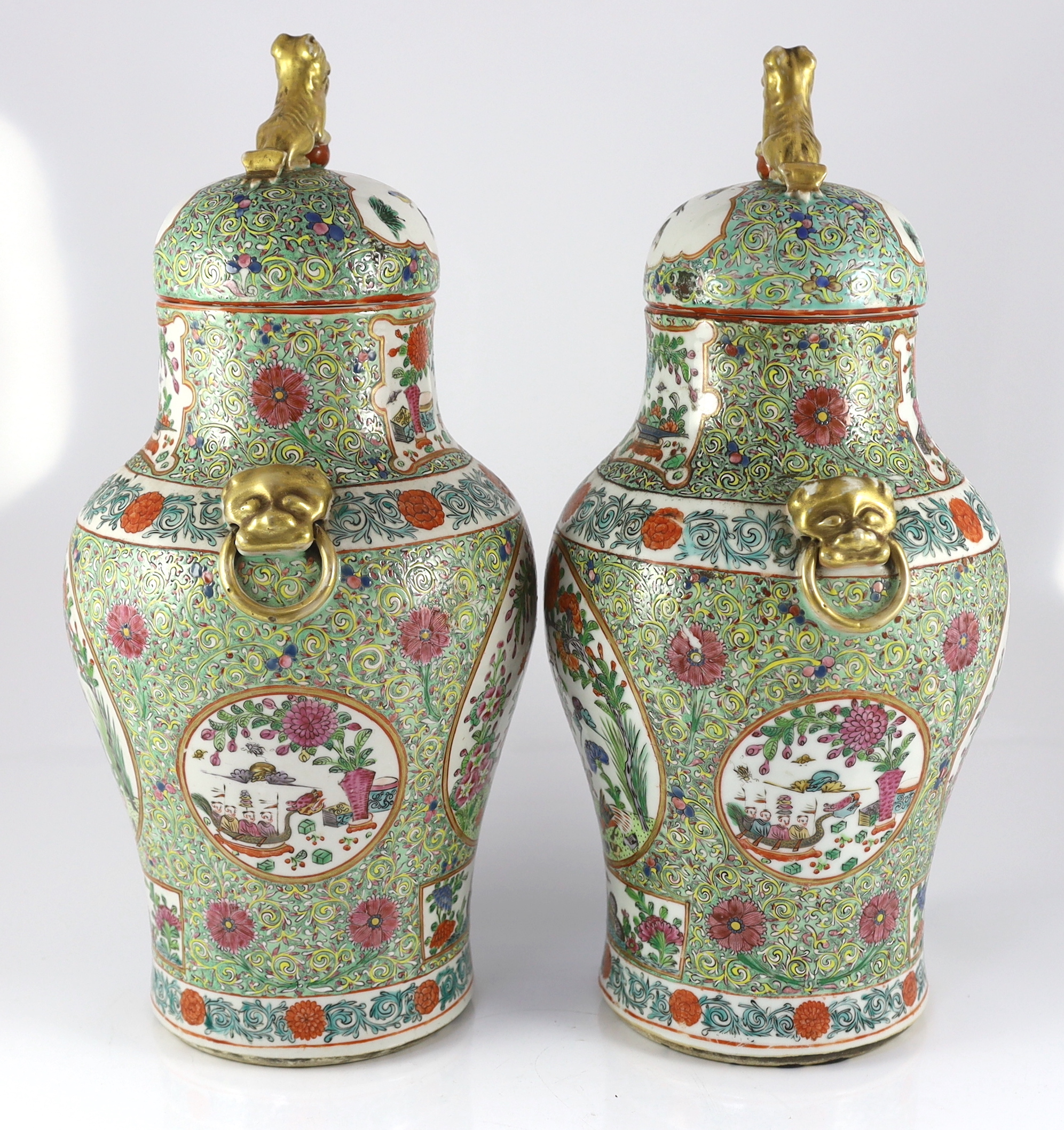 A pair of Chinese enamelled porcelain vases and covers, early 20th century